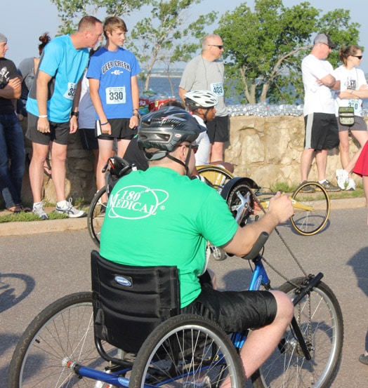 180 Medical employee handcycling at the event