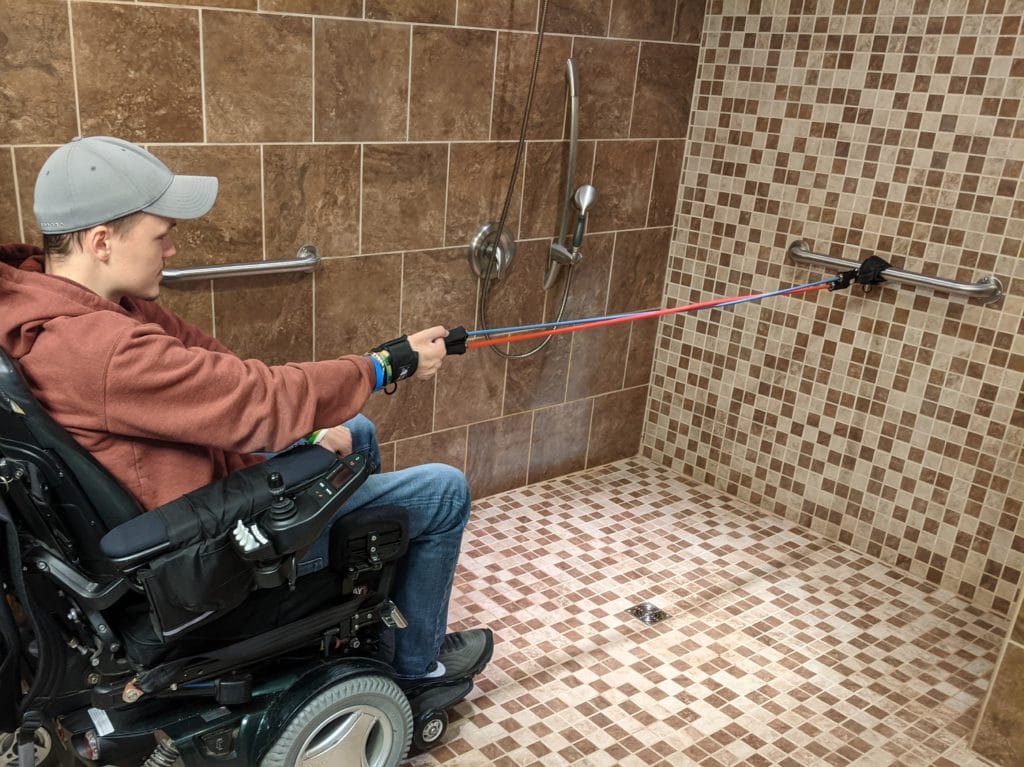 Mason exercising with spinal cord injury