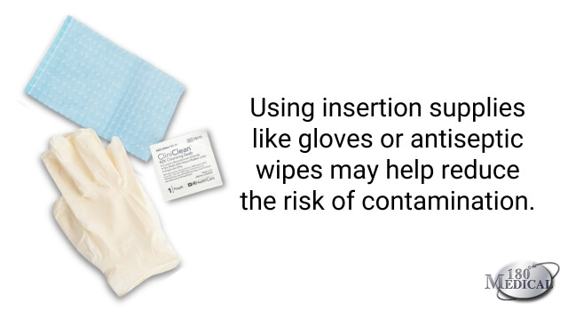 catheter insertion supplies including gloves, antiseptic wipes, and drape