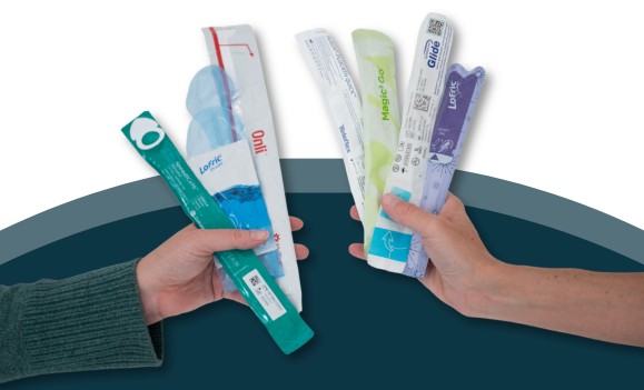 hands holding variety of hydrophilic catheters